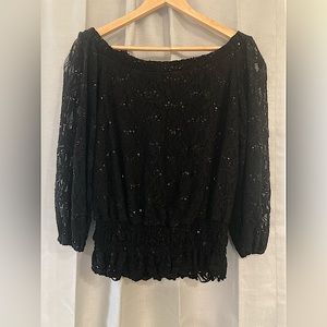 Black sequence embroidery blouse.